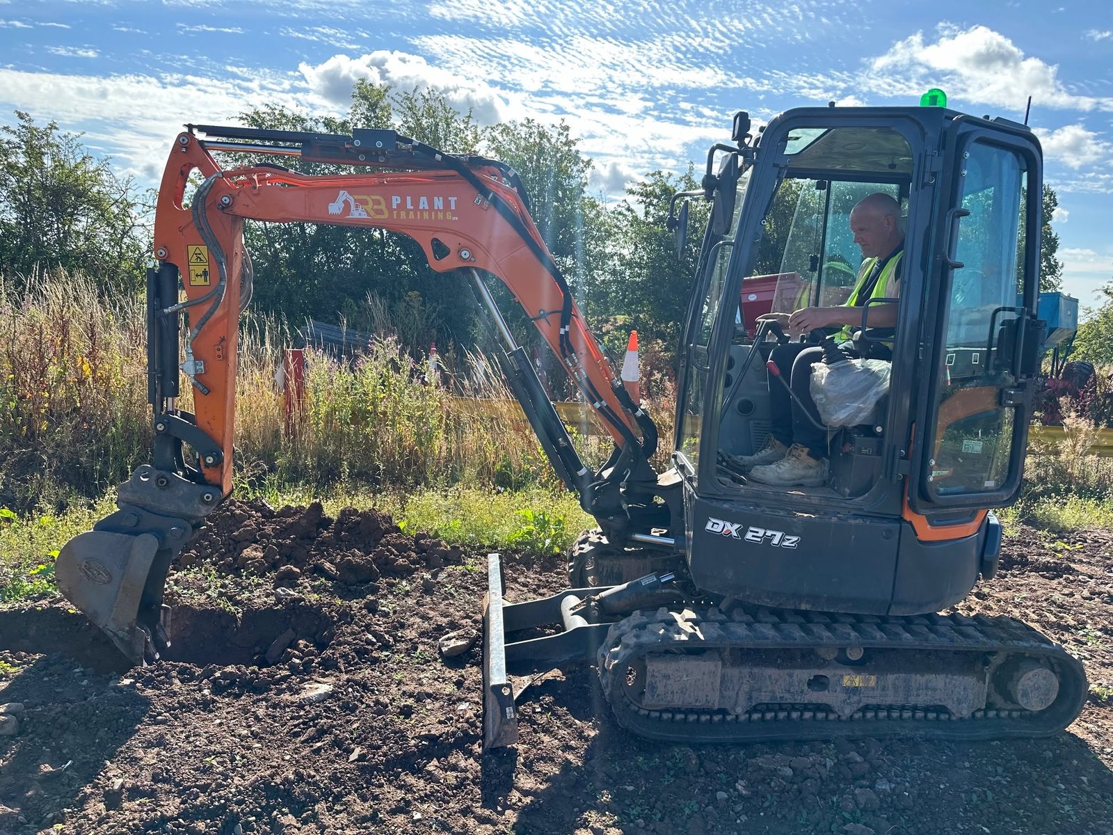 Excavator carrying out groundworks